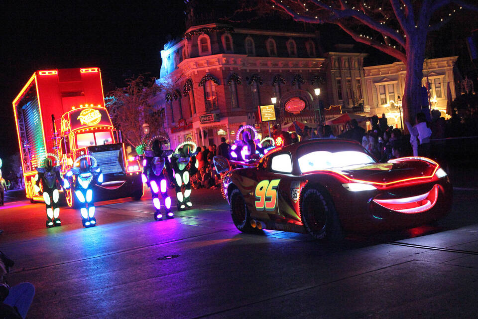 An illuminated Lightning McQueen vehicle in Disneyland's Paint the Night parade in 2015.